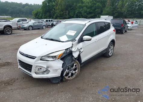 2016 Ford Escape Titanium z USA, uszkodzony, nr VIN 1FMCU9J99GUA07479